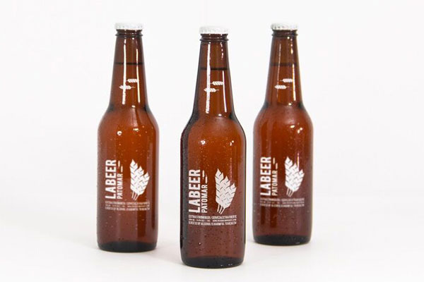 Mockup Showing Three Standing Beer Bottles with Metallic Caps