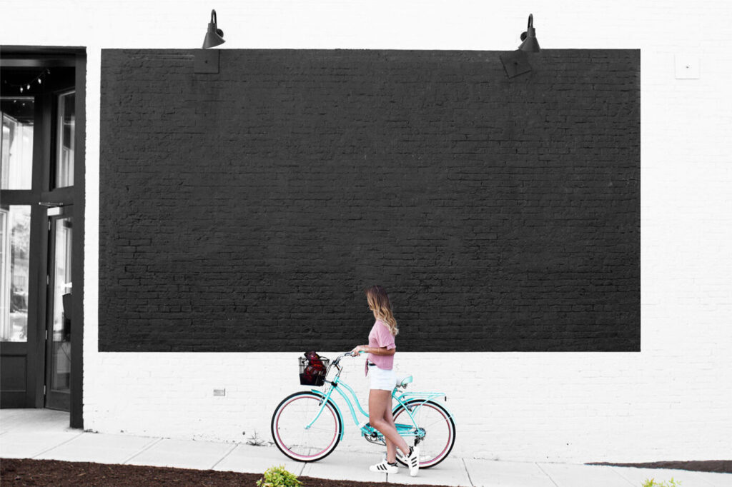 Mural Mockup With a Girl on Bicycle