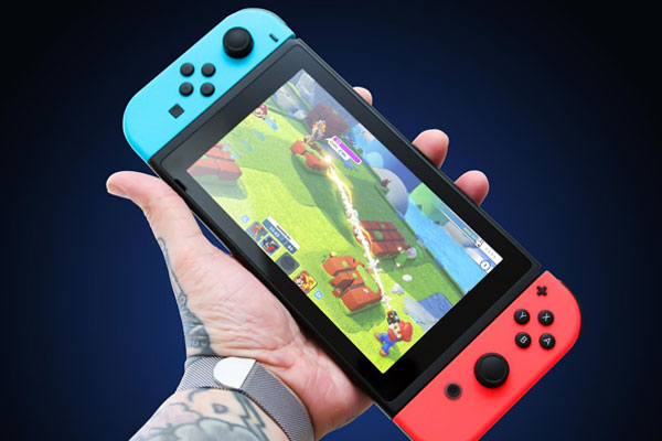 Nintendo Switch Holding by Hand Mockup