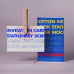 Notebook and Pin Holding Card Showcase Mockup
