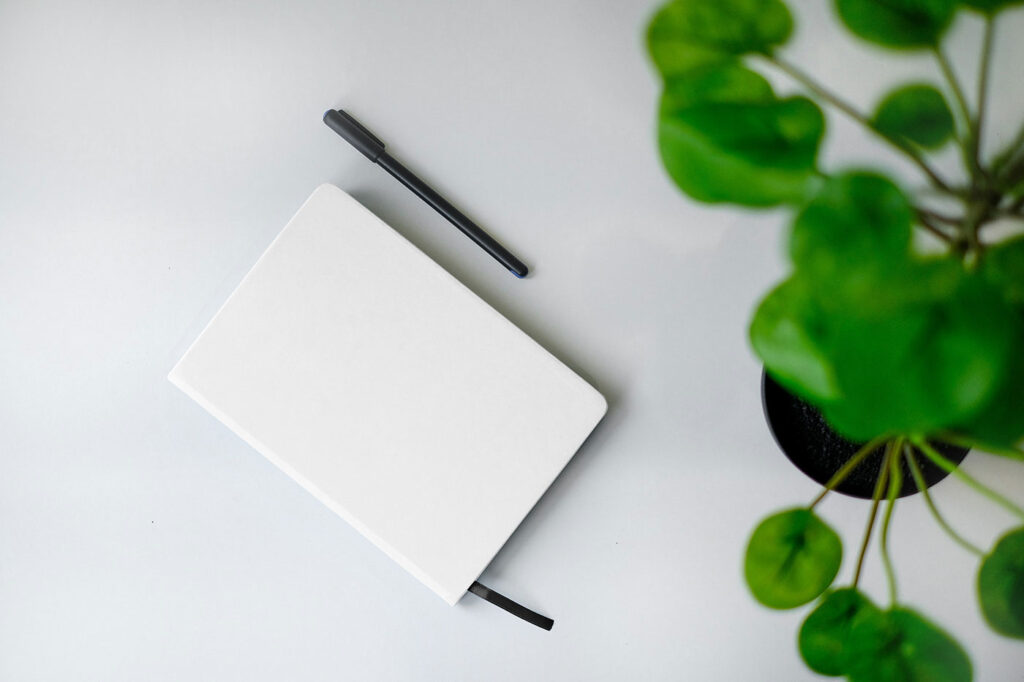 Notebook with Plant Mockup