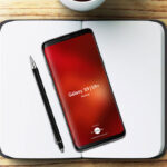 Notebook With Samsung Galaxy S9 And S9+ Mockup