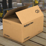Open Cardboard Packaging Delivery Box in a Storage Mockup