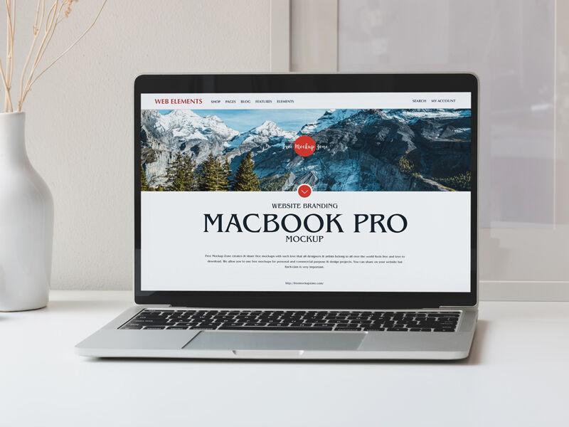 Open MacBook Pro on a Table Mockup