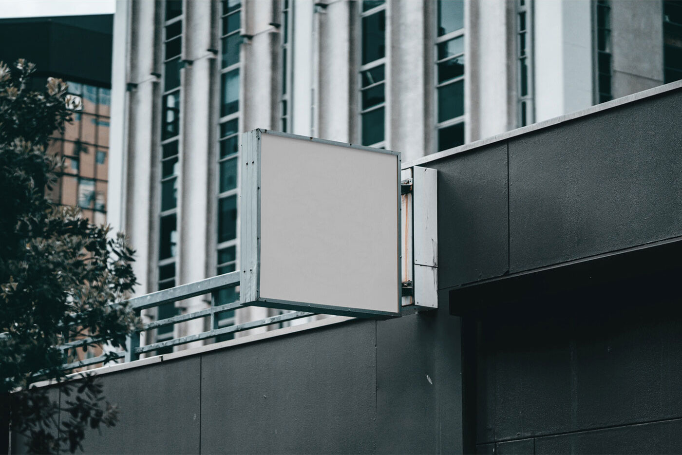 Outdoor View of a Sign on Building Mockup FREE PSD
