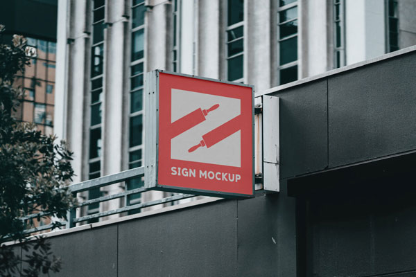 Outdoor View of a Sign on Building Mockup