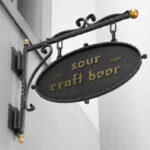 Oval Metal Hanging Pub Sign Mockup