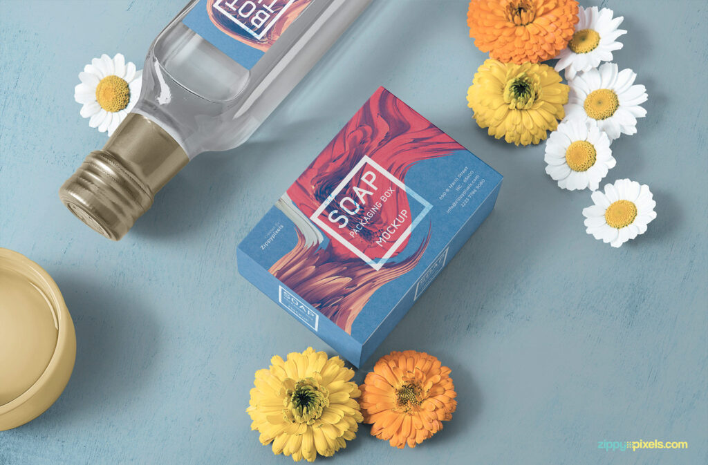 Overhead Soap Packaging with Flowers Mockup