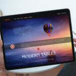 Overhead View of Hands Holding a Tablet Mockup