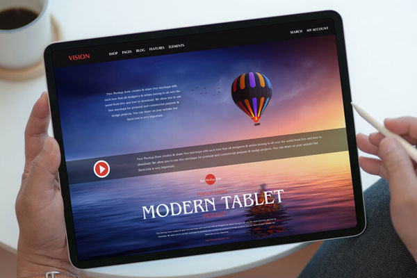 Overhead View of Hands Holding a Tablet Mockup