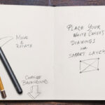 Overhead View of Opened Sketchbook and Pens Mockup