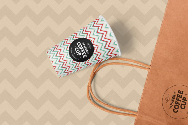 Overhead View of Paper Coffee Cup and Shopping Bag Mockup