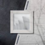Overhead View of Square Picture Frame on Wall Background Mockup