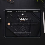 Overhead View of Tablet Surrounded by Stationery Items Mockup
