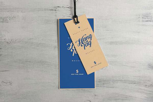 Overhead View of Two Cloth Tags on Wooden Surface Mockup