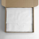 Overhead View Wrapping Tissue Paper in a Box Mockup