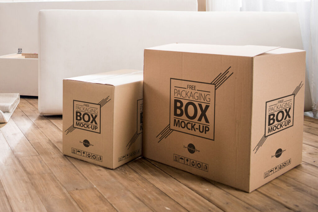 Packaging Boxes on Wooden Floor With Internal Design Mockup