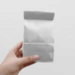 Paper Coffee Bag Mockup In Hand