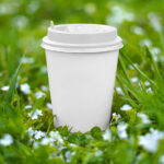 Paper Cup on Grass Mockup