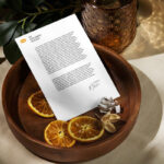 Paper Letterhead Mockup with Dried Orange in Perspective Sight