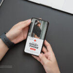 Person Using a Full-screen Smartphone Mockup