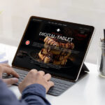 Person Working on Tablet with Keyboard Mockup