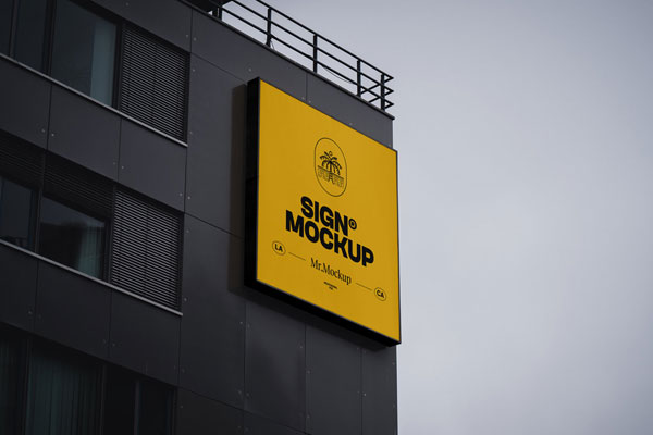 Perspective Shot of Sign Mockup on Building