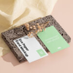 Perspective Showcase of Double Business Card Mockup on Brick