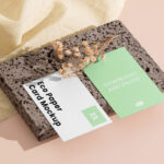 Perspective Showcase of Double Business Card Mockup on Brick