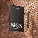 Perspective Sight of 2 Street Sign Mockups on Brick Wall