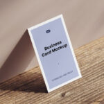 Perspective Sight of Business Card Mockup on Wood Table