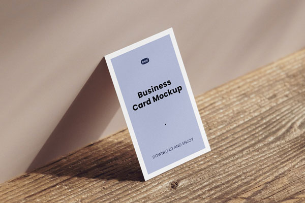 Perspective Sight of Business Card Mockup on Wood Table