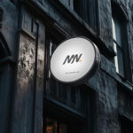 Perspective Sight of Circle Signboard Mockup on Building Wall