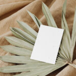 Perspective Sight of Eco Paper Card Mockup on Leaf