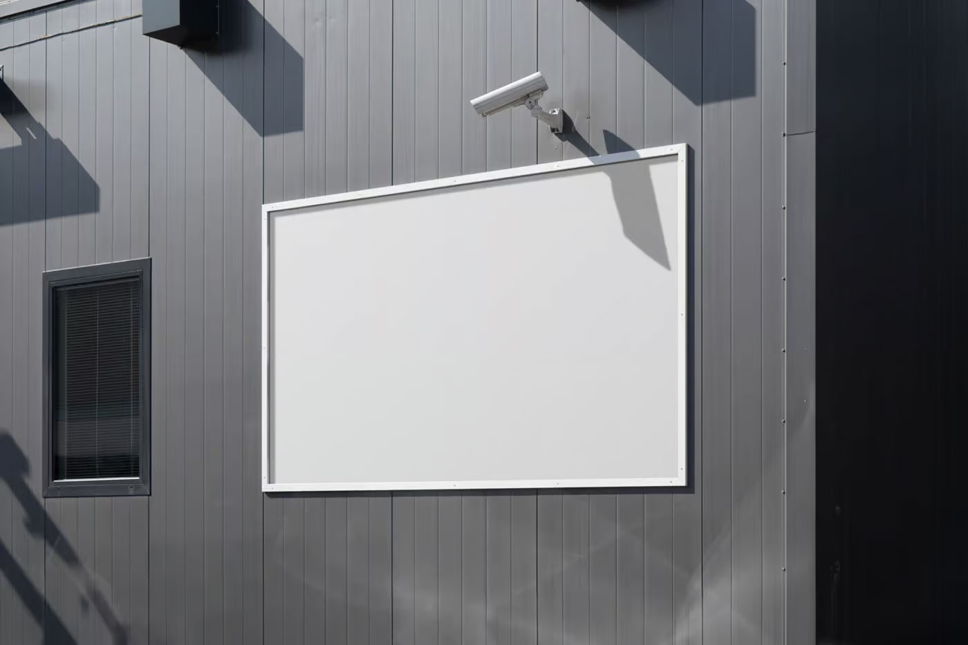 Free Perspective Sight of Horizontal Billboard Mockup on Metal Building PSD Template