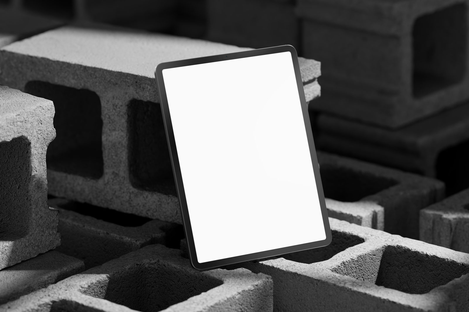 Free Perspective Sight of iPad Pro Mockup on Brick PSD Template