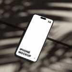 Perspective Sight of iPhone 14 Pro Max Mockup on Concrete