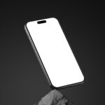 Perspective Sight of iPhone 15 Pro Mockup on Rock