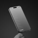 Perspective Sight of iPhone 15 Pro Mockup on Rock