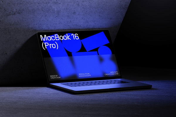Perspective Sight of MacBook 16 Pro Mockup on Concrete Background