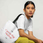 Perspective Sight of Sitting Woman Wears Canvas Bag Mockup