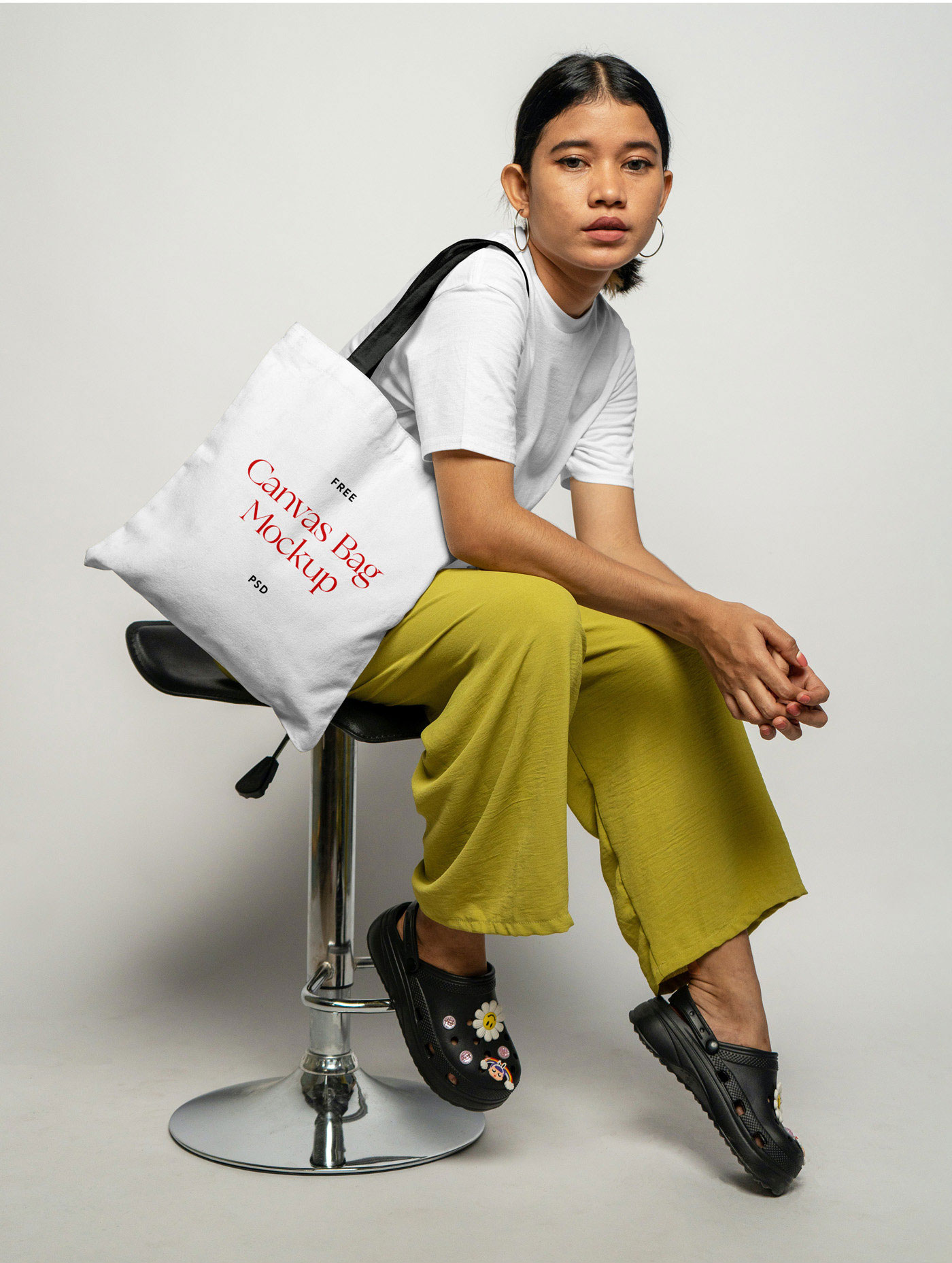 Perspective Sight of Sitting Woman Wears Canvas Bag Mockup FREE PSD