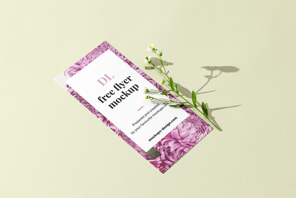 Perspective View DL-Size Flyer With Flower on Clean Surface Mockup