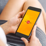 Perspective View Girl Working with Smartphone Mockup