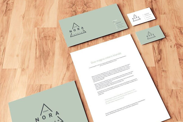 Perspective View Mockup Scene of Stationery on Wooden Floor