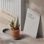 Perspective View of 2 Papers Mockups with Plant