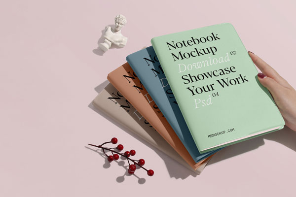Perspective View of 4 Notebooks Mockup on Top of Each Other