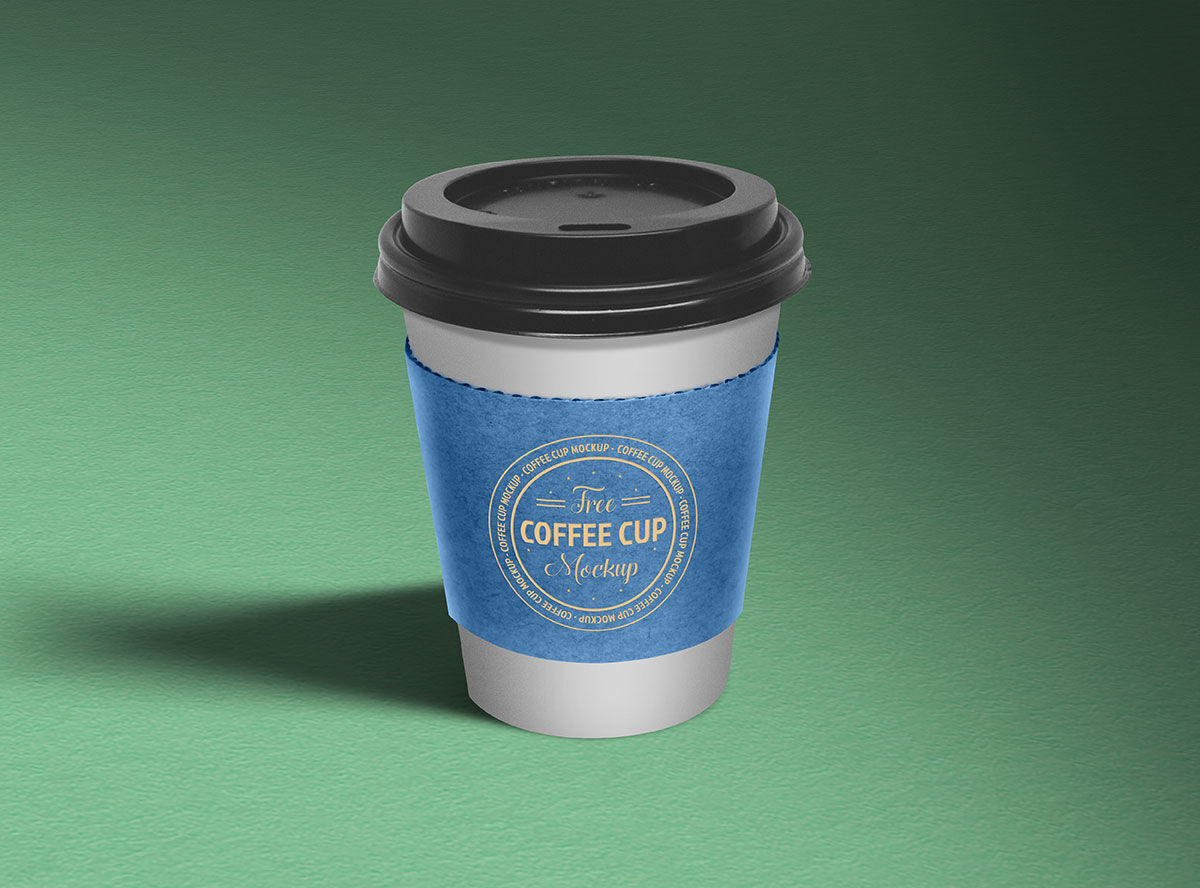Perspective View of a Paper Coffee Cup Mockup FREE PSD