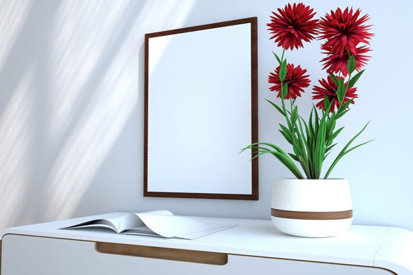 Perspective View of a Poster Frame Hanging on a Wall Mockup