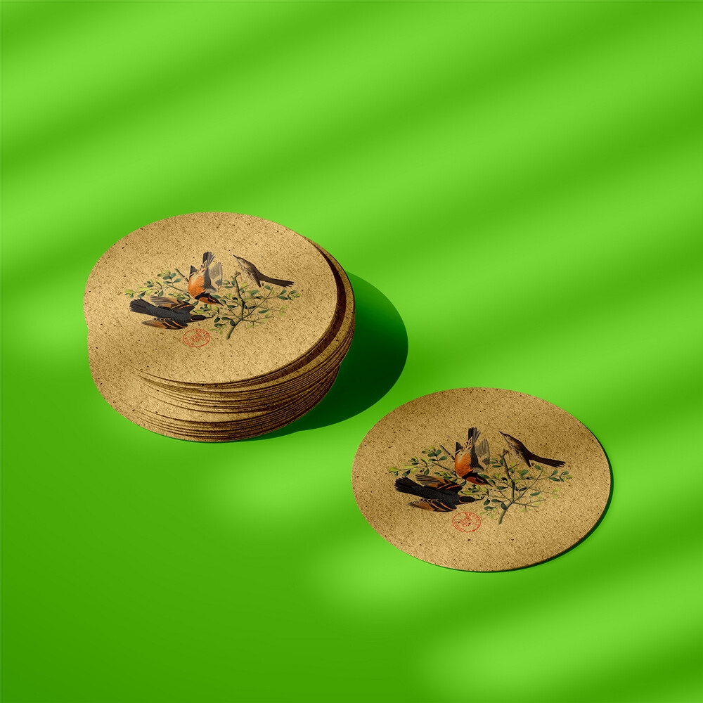 Perspective View of a Stack of Round Tea Coasters Mockup